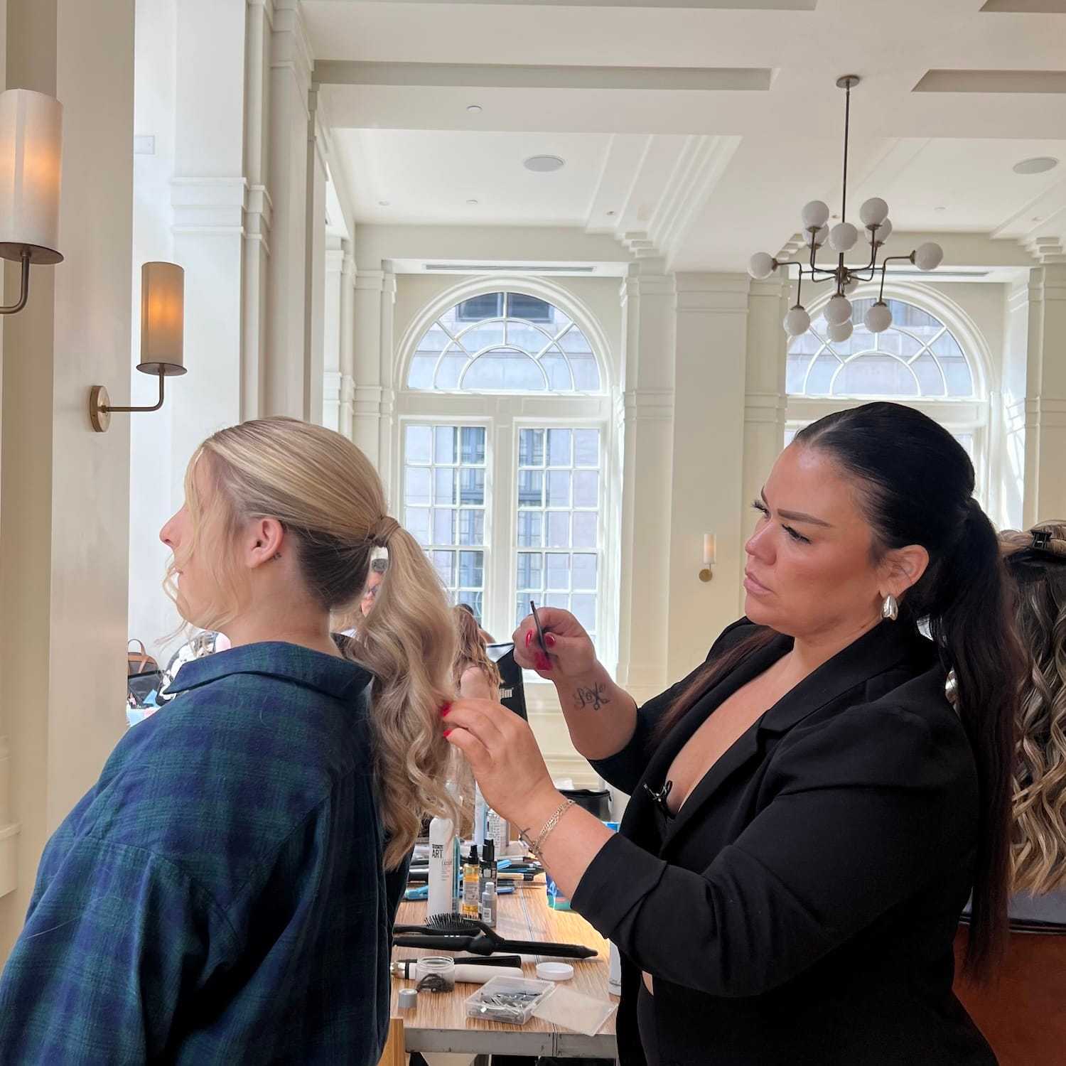 Portrait of KAYCE DENTON WALL, a professional stylist at KAYCE + CO, showcasing their expertise and style.