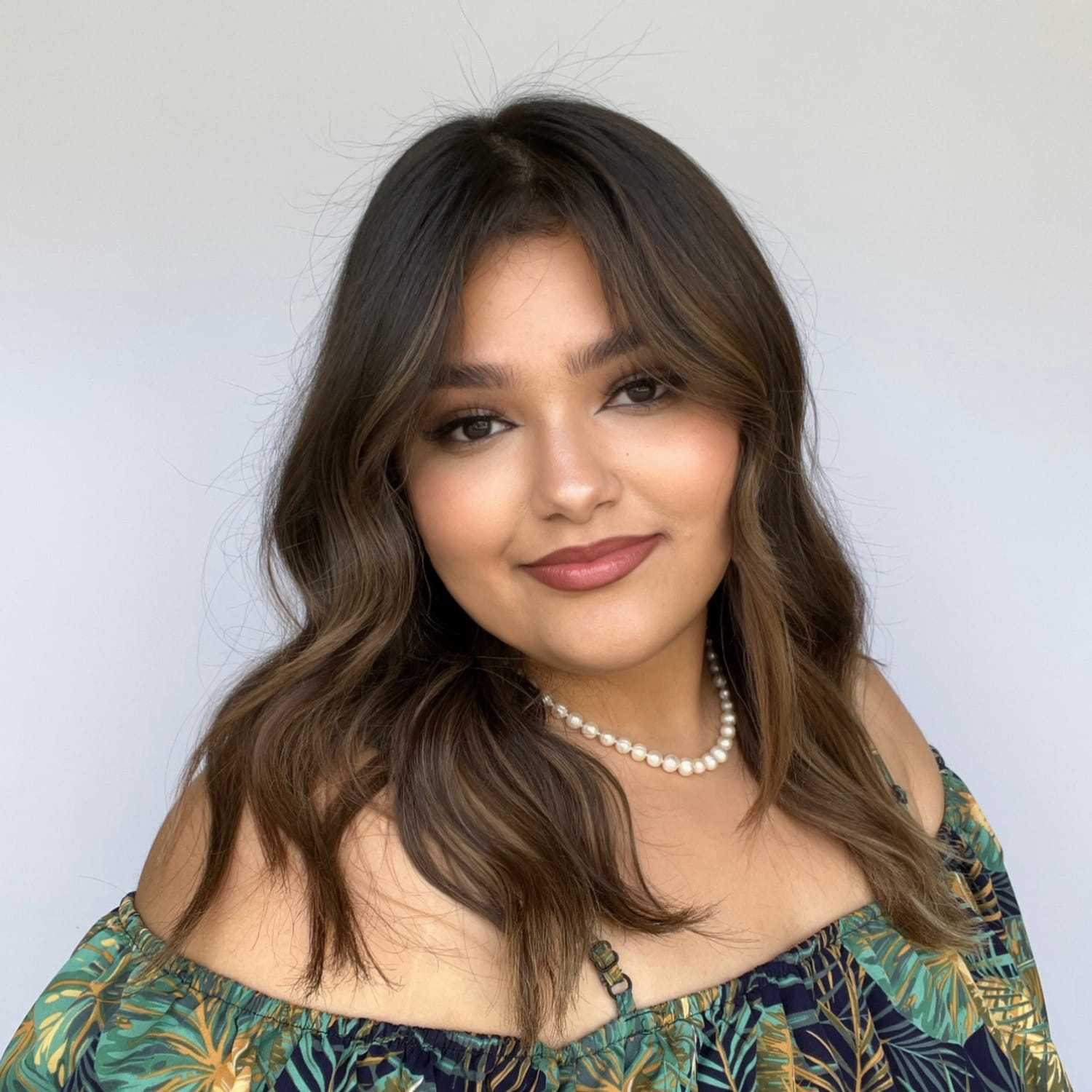 Portrait of ALONDRA ORTIZ, a professional stylist at KAYCE + CO, showcasing their expertise and style.